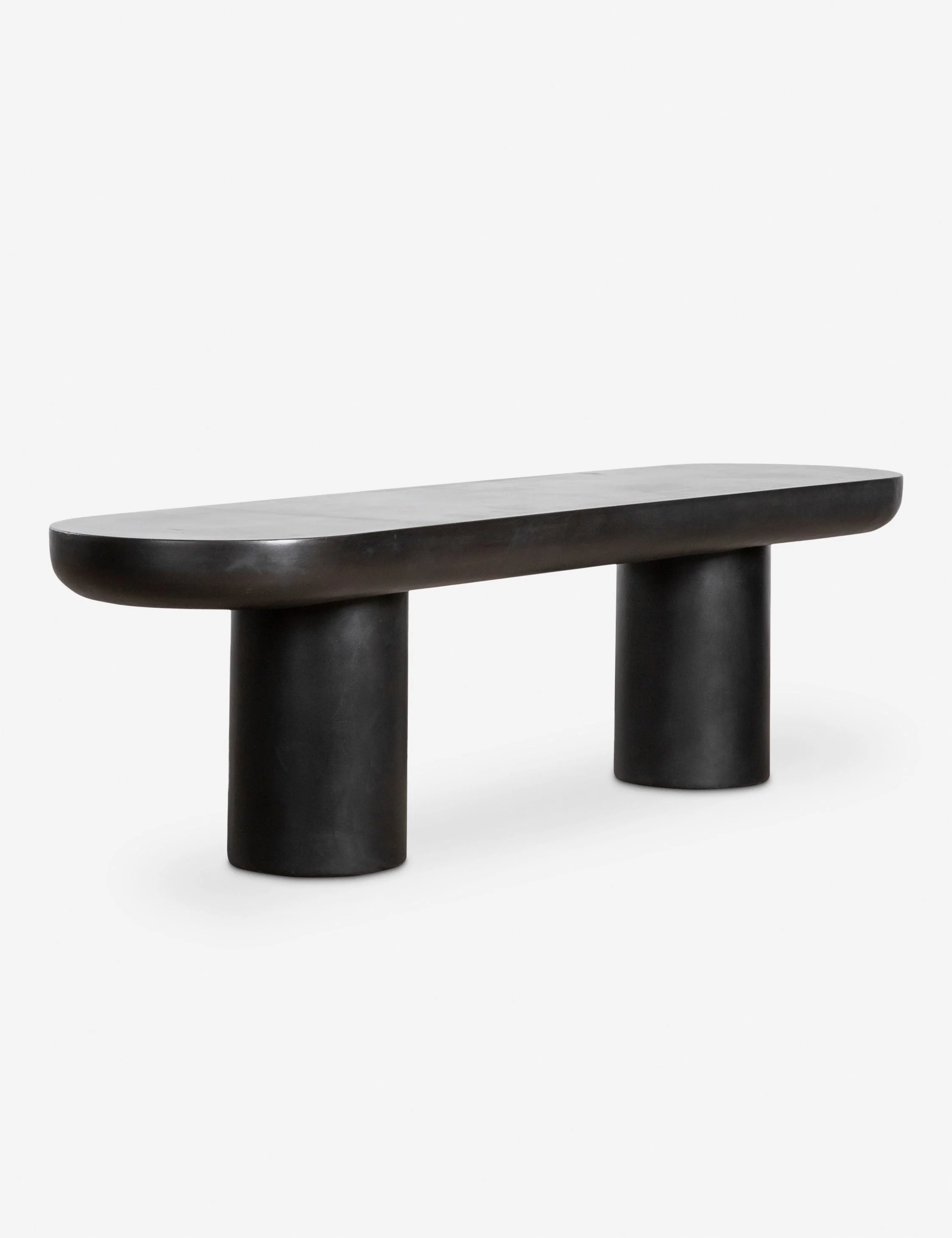 / Outdoor Bench - Sculptural lines soften and offer dramatic appeal to the sleek black-finished cement construction of this collection